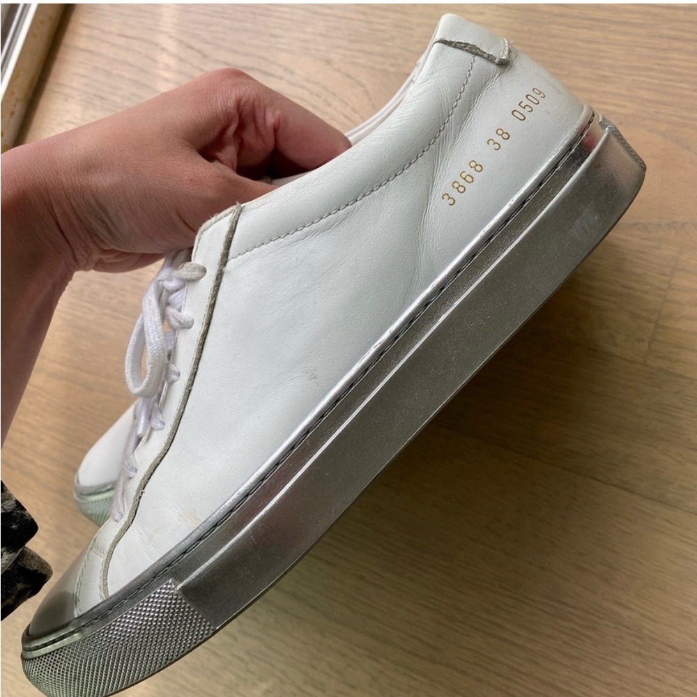 White Common Project sneakers with silver soles 👟
